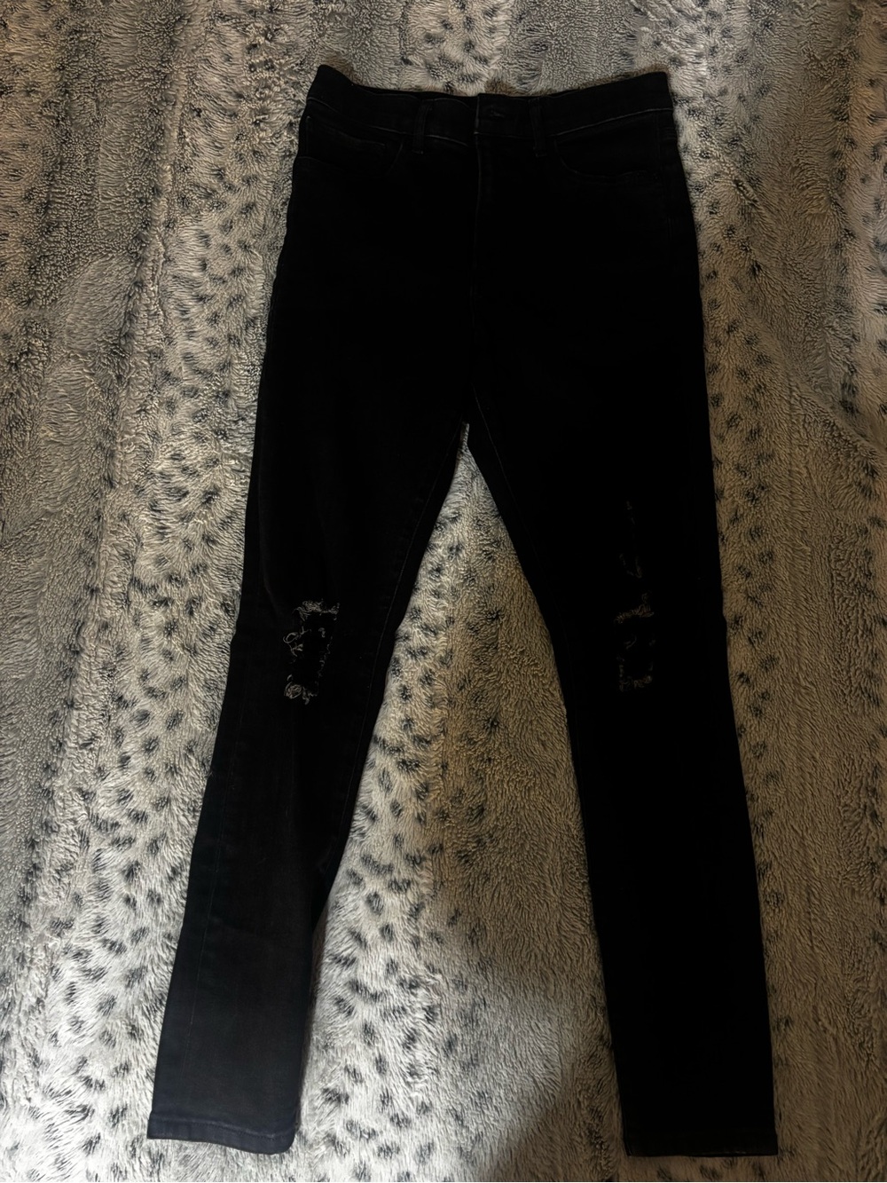 Black  Express Women’s Skinny Jeans High-Rise Stretchy. Ripped at knees. Size 8.